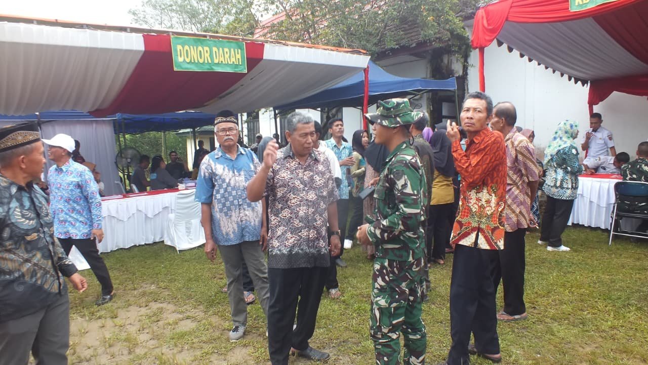Sambutan Warga Meriahkan Kehadiran Satgas TMMD Ke-128 di Desa Sungai Hijau